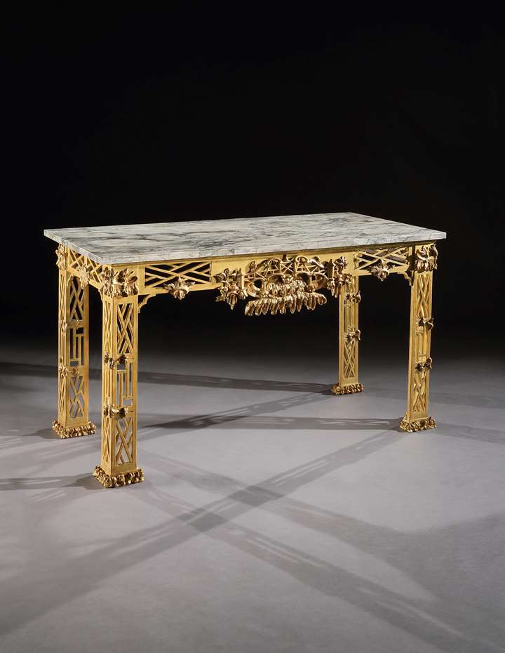 A pair of giltwood side tables